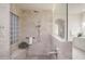 Luxurious bathroom featuring a walk-in shower with glass block window and dual shower heads at 5921 E Leisure Ln, Carefree, AZ 85377