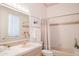 Charming bathroom with a bathtub, shower, and vanity with a light wood finish at 5921 E Leisure Ln, Carefree, AZ 85377