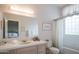 Cozy bathroom with a bathtub, shower, and vanity with tile countertop at 5921 E Leisure Ln, Carefree, AZ 85377