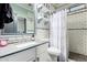 Modern bathroom featuring subway tile, granite countertops, and stylish fixtures at 597 S 221St Dr, Buckeye, AZ 85326