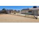A fenced backyard view featuring a pool and a storage shed at 6104 W Marconi Ave, Glendale, AZ 85306
