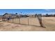 Fenced backyard features a dirt lot and a shed, offering potential for customization at 6104 W Marconi Ave, Glendale, AZ 85306