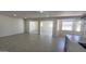 Bright, open-concept living area featuring tiled floors and lots of natural light at 6104 W Marconi Ave, Glendale, AZ 85306
