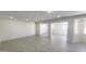 Bright, open-concept living area with tiled floors at 6104 W Marconi Ave, Glendale, AZ 85306