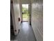 Hallway leading to a secure gate providing access to the backyard at 6637 E Culver St, Scottsdale, AZ 85257