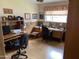 Functional home office with dual workstations, natural light, and ample storage for productivity at 6637 E Culver St, Scottsdale, AZ 85257