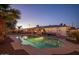 Backyard with a large inground swimming pool and covered patio area, ideal for outdoor entertaining at 6901 E Oak St, Scottsdale, AZ 85257