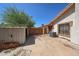 Fenced backyard with a shed and patio at 6940 W Willow Ave, Peoria, AZ 85381