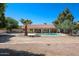 Enjoy the backyard oasis featuring a sparkling pool, desert landscaping, and an inviting outdoor space at 6940 W Willow Ave, Peoria, AZ 85381