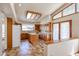 Light-filled kitchen with custom cabinets, center island, and tile floors at 6940 W Willow Ave, Peoria, AZ 85381