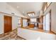Eat-in kitchen features center island, custom cabinets, and tile flooring at 6940 W Willow Ave, Peoria, AZ 85381
