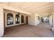 Spacious covered patio features beamed ceilings, ceiling fan, and plenty of room for relaxing and entertaining at 6940 W Willow Ave, Peoria, AZ 85381