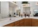Bathroom with dual sinks and large mirrors offering plenty of light at 7006 E Jensen St # 48, Mesa, AZ 85207