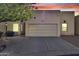 Inviting single-story home with a two-car garage and a well-maintained front yard at 7006 E Jensen St # 48, Mesa, AZ 85207