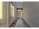 Welcoming front entrance with a secure door, sidelight, and attractive landscaping elements at 7006 E Jensen St # 48, Mesa, AZ 85207