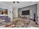 Spacious living room features a fireplace and modern furnishings at 7006 E Jensen St # 48, Mesa, AZ 85207