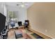 Home office area with bright natural light and comfortable chairs at 7006 E Jensen St # 48, Mesa, AZ 85207