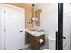 Stylish bathroom featuring unique tilework, modern vanity, and updated fixtures at 802 N Lisbon Dr, Chandler, AZ 85226