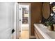 Elegant bathroom featuring a soaking tub and dual vanities at 802 N Lisbon Dr, Chandler, AZ 85226