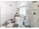 Bright bathroom features a standalone tub, shower with glass, and modern accents at 802 N Lisbon Dr, Chandler, AZ 85226