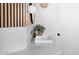 Close-up of a bathroom vanity with white marble countertop and elegant fixtures at 802 N Lisbon Dr, Chandler, AZ 85226