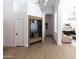 Charming entryway features a built-in hall tree for organization and style, with seamless flow to other rooms at 802 N Lisbon Dr, Chandler, AZ 85226