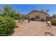 Large backyard with pergola, providing a serene outdoor space with lush landscaping, perfect for relaxation and entertainment at 872 E Saratoga St, Gilbert, AZ 85296