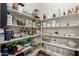 Walk-in pantry with organized shelving, providing ample storage for all your kitchen essentials at 872 E Saratoga St, Gilbert, AZ 85296