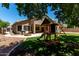 This expansive backyard features a playset, firepit, and shaded patio area at 927 S Ash St, Gilbert, AZ 85233