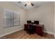 This bedroom features a desk and chair with monitors, ideal for a home office at 927 S Ash St, Gilbert, AZ 85233