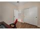 This bedroom boasts wood floors, a large closet, and a serene atmosphere at 927 S Ash St, Gilbert, AZ 85233