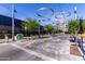Unique urban outdoor space with decorative elements and landscaping for community enjoyment at 927 S Ash St, Gilbert, AZ 85233