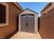 This backyard features a convenient storage shed for tools and garden equipment at 927 S Ash St, Gilbert, AZ 85233