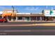 Charming shops with unique facades along a vibrant street, perfect for exploring and discovering hidden gems at 927 S Ash St, Gilbert, AZ 85233