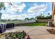 Backyard featuring a fenced yard, lawn, and patio at 1022 S Butte Ln, Gilbert, AZ 85296