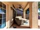 Covered outdoor patio with seating at 1022 S Butte Ln, Gilbert, AZ 85296
