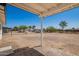 View of a large fenced backyard from under the patio roof at 10693 N Arapaho Dr, Casa Grande, AZ 85122