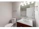 Traditional bathroom with updated vanity, and a toilet next to a shower-tub combo at 10693 N Arapaho Dr, Casa Grande, AZ 85122