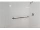 Bright shower-tub combo with white tile and safety bar at 10693 N Arapaho Dr, Casa Grande, AZ 85122