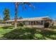 Well-maintained exterior with a peaceful backyard and an inviting patio area for relaxation and entertainment at 10913 W Caron Dr, Sun City, AZ 85351