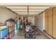 Spacious garage with ample storage, featuring a clean interior and functional layout for vehicles and equipment at 10913 W Caron Dr, Sun City, AZ 85351