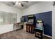 Fun game room featuring a variety of arcade games and a window for light at 11829 W Patrick Ln, Sun City, AZ 85373