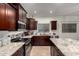 Beautiful kitchen featuring stainless steel appliances and granite countertops with ample prep space at 11829 W Patrick Ln, Sun City, AZ 85373