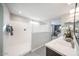 Modern bathroom featuring a sleek shower and stylish vanity at 12233 W Caraveo Pl, Peoria, AZ 85383