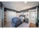 Inviting bedroom with closet and serene atmosphere, perfect for relaxation at 12233 W Caraveo Pl, Peoria, AZ 85383