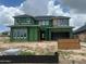 Exterior shot of a two-story home under construction at 12233 W Caraveo Pl, Peoria, AZ 85383