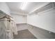 Organized walk-in closet offers ample storage and hanging space at 12233 W Caraveo Pl, Peoria, AZ 85383