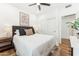 Comfortable bedroom with neutral decor, a cozy bed, and ample natural light at 16428 N 59Th St, Scottsdale, AZ 85254