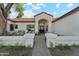Charming front entrance featuring a paved walkway and comfortable outdoor seating at 16428 N 59Th St, Scottsdale, AZ 85254