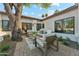 Cozy outdoor patio with comfortable seating, perfect for relaxing and entertaining guests at 16428 N 59Th St, Scottsdale, AZ 85254